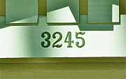 Sears Catalog House Numbers after original steel numbers disintegrated; meticulously reproduced (and cast in bronze) by Dwight H. Bennett. 